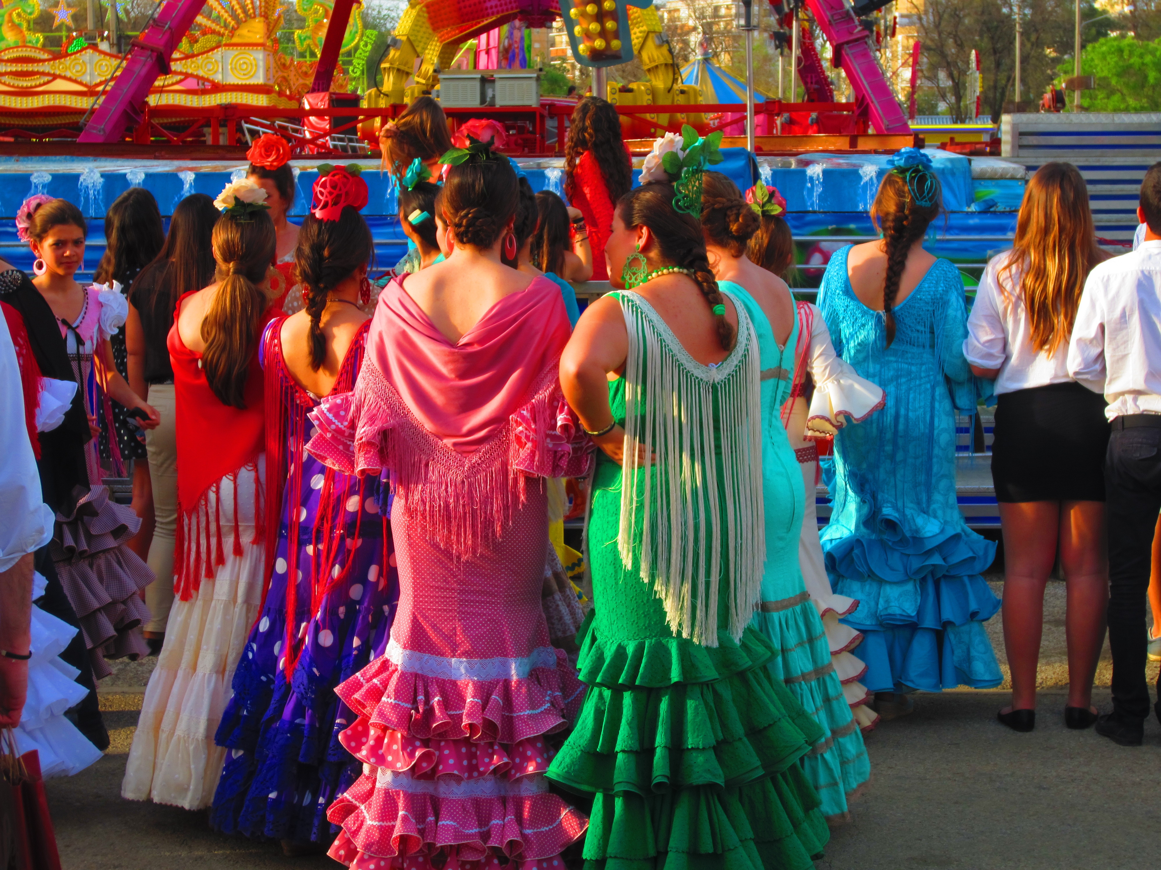 Andalusian women dressed in the traditional "traje de gitana" during the annual Seville Spring Fair.