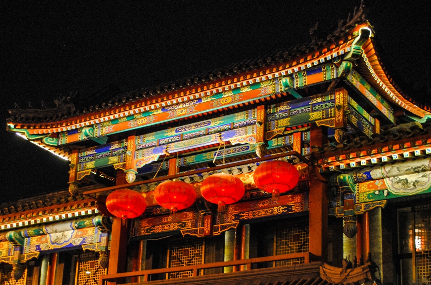 Beijing's rooftops light up the sky.