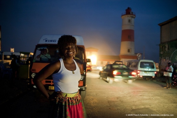 The blog's author, Camaro, stands in the streets of Accra.