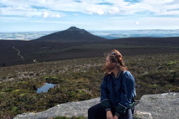 Mikee overlooking Bennachie Hills in Aberdeenshire, Scotland.