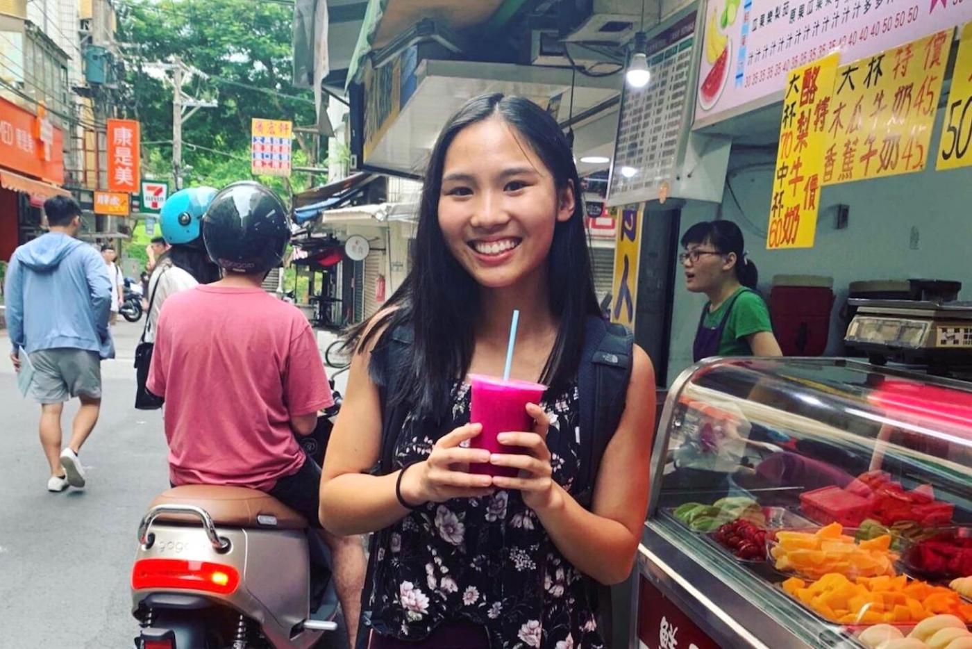 Iris with her after-school snack, 100 per cent natural (and ultra-pink) dragon fruit juice. 