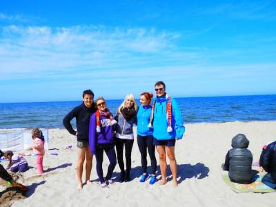 Amber, centre, stands with friends during her road trip across Poland.